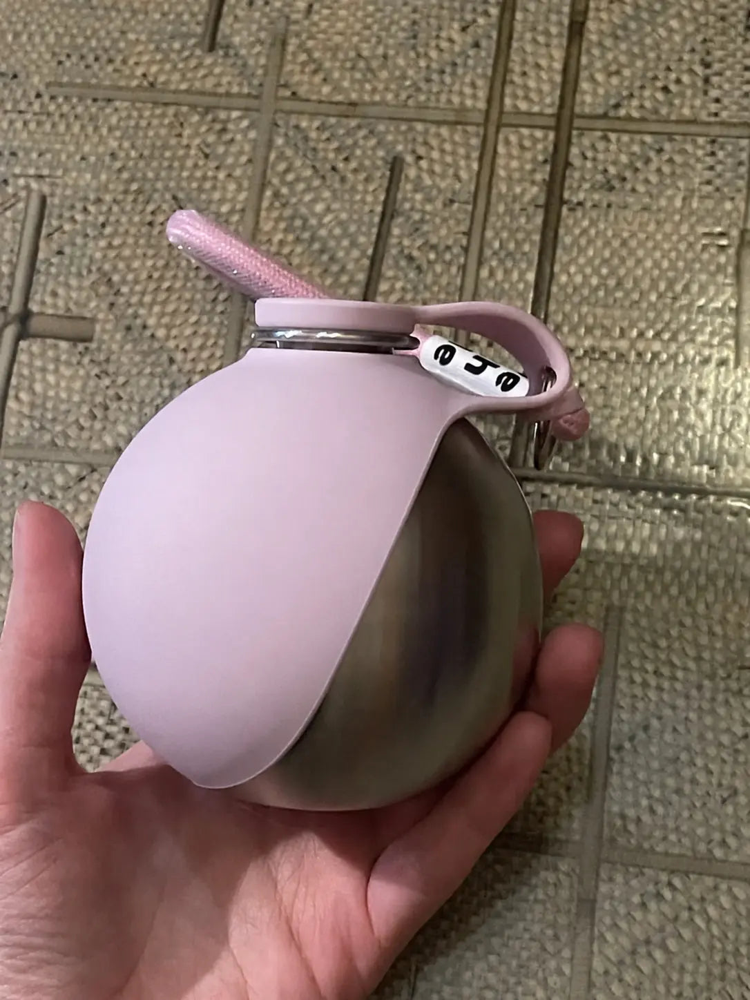 Pink PawCoop dog water bottle close up